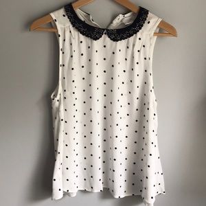 Blue and white polka dot blouse